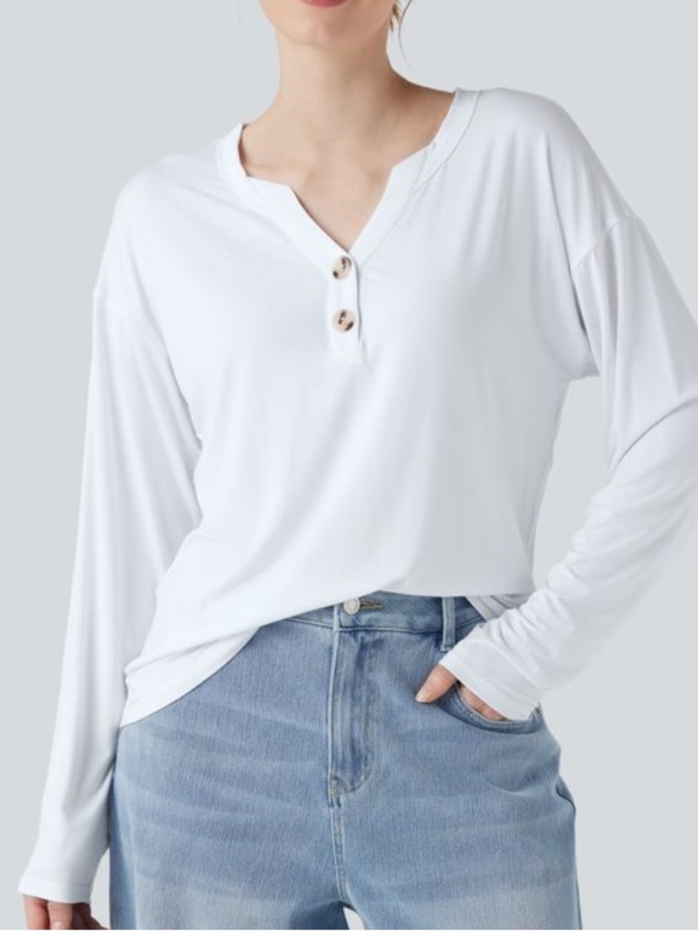 HALARA White Long-Sleeve Henley with Button Detail. FA26